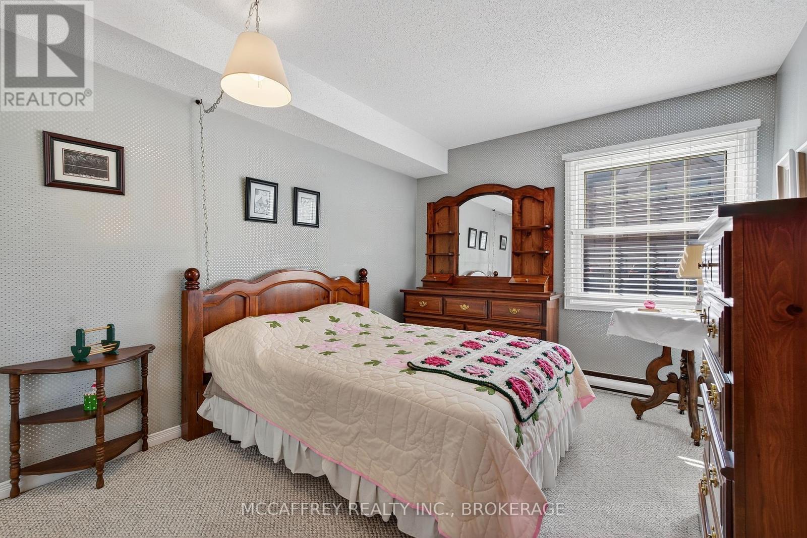 103 - 11 Centre Street S, Greater Napanee (Greater Napanee), ON - Indoor Photo Showing Bedroom