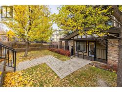 small grassy area by patio -