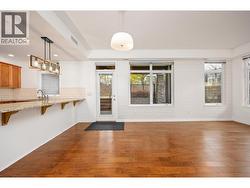 Engineered hardwood flooring completes the polished look -