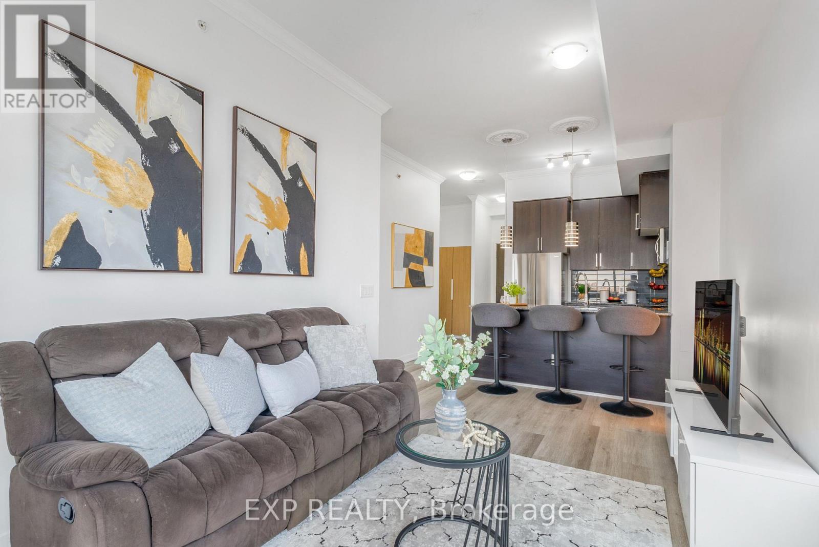 1609 - 840 Queens Plate Drive, Toronto, ON - Indoor Photo Showing Living Room