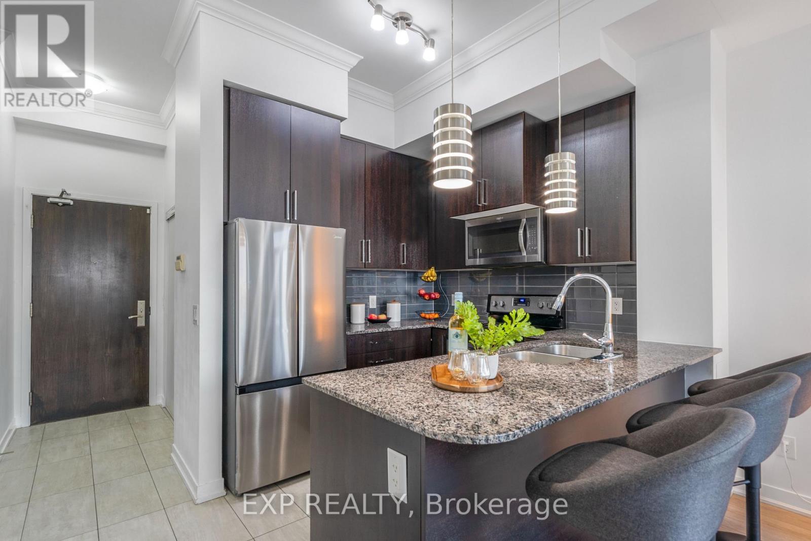 1609 - 840 Queens Plate Drive, Toronto, ON - Indoor Photo Showing Kitchen With Stainless Steel Kitchen With Double Sink With Upgraded Kitchen