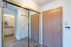 Front Entrance Closet with Sliding Glass Door -