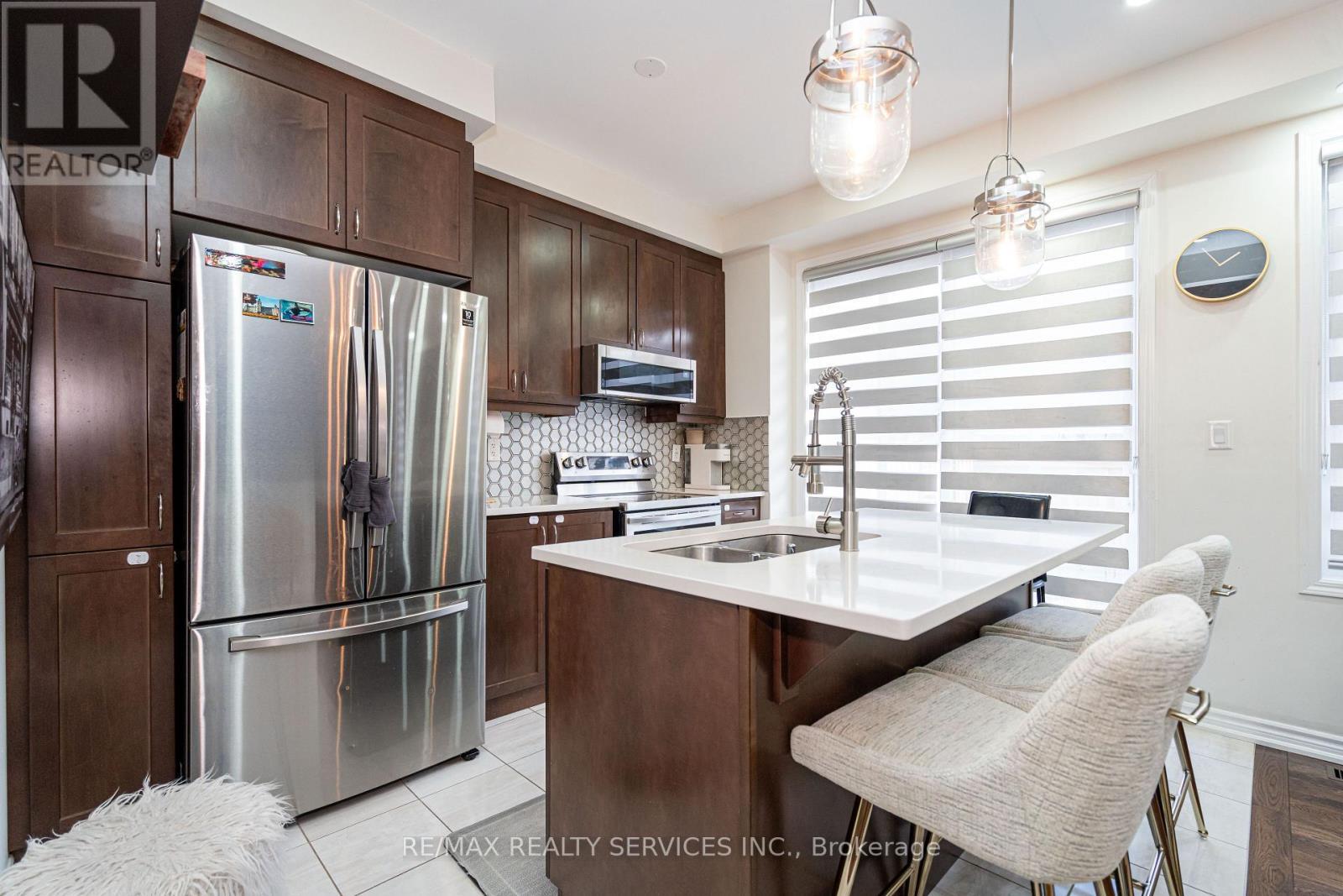 11 Cyclone Trail, Brampton, ON - Indoor Photo Showing Kitchen With Stainless Steel Kitchen With Double Sink