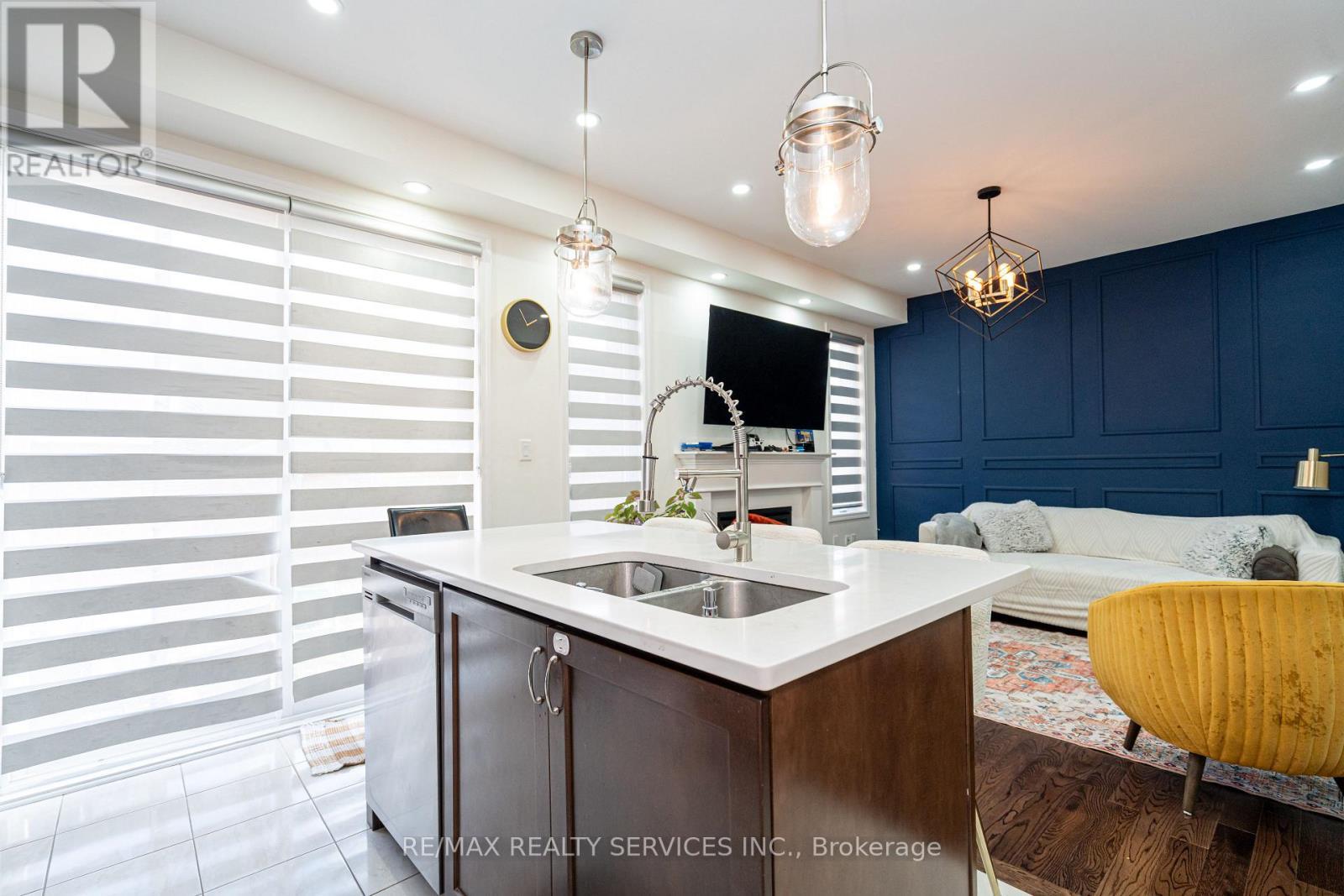 11 Cyclone Trail, Brampton, ON - Indoor Photo Showing Kitchen With Double Sink