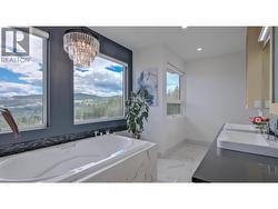 5pce luxury ensuite with access to a large walk in closet -