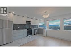 2bdrm Legal Suite w/separate entrance and views of Lake Okanagan -