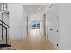 Foyer looking down the hallway to the kitchen and living room with incredible valley and lake views -