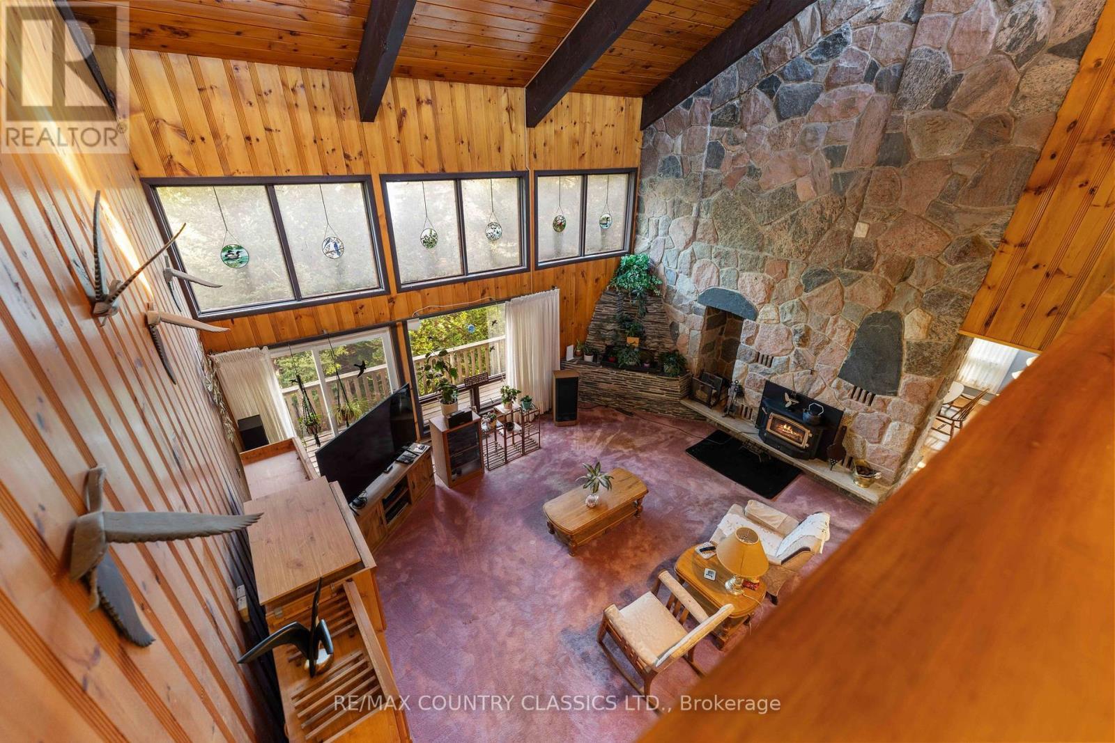 13 Lorbetskie Road, Madawaska Valley, ON - Indoor With Fireplace