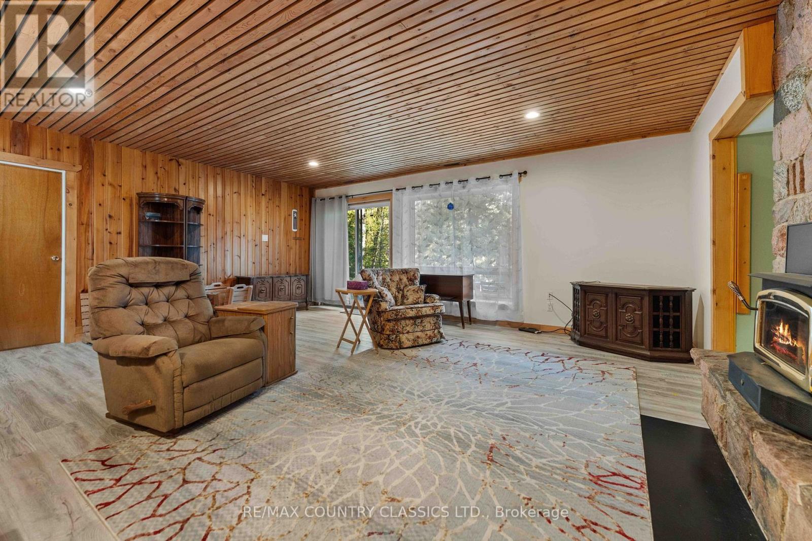 13 Lorbetskie Road, Madawaska Valley, ON - Indoor With Fireplace