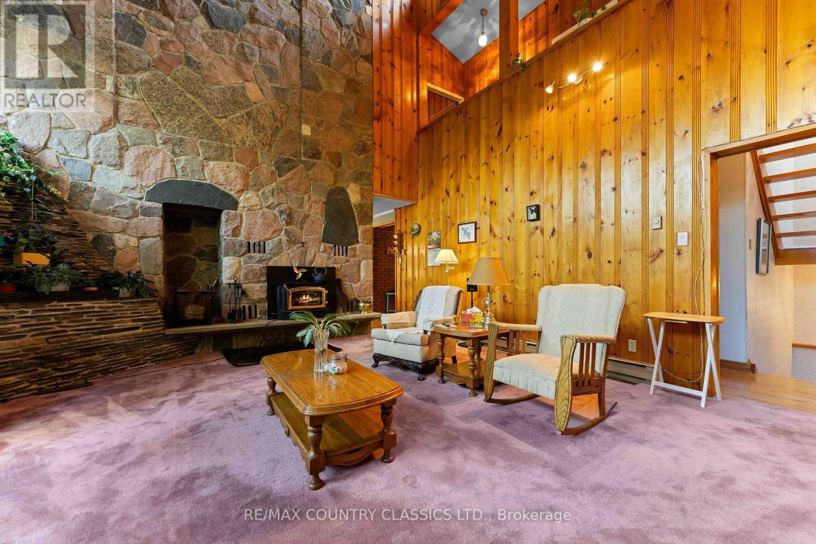 13 Lorbetskie Road, Madawaska Valley, ON - Indoor With Fireplace