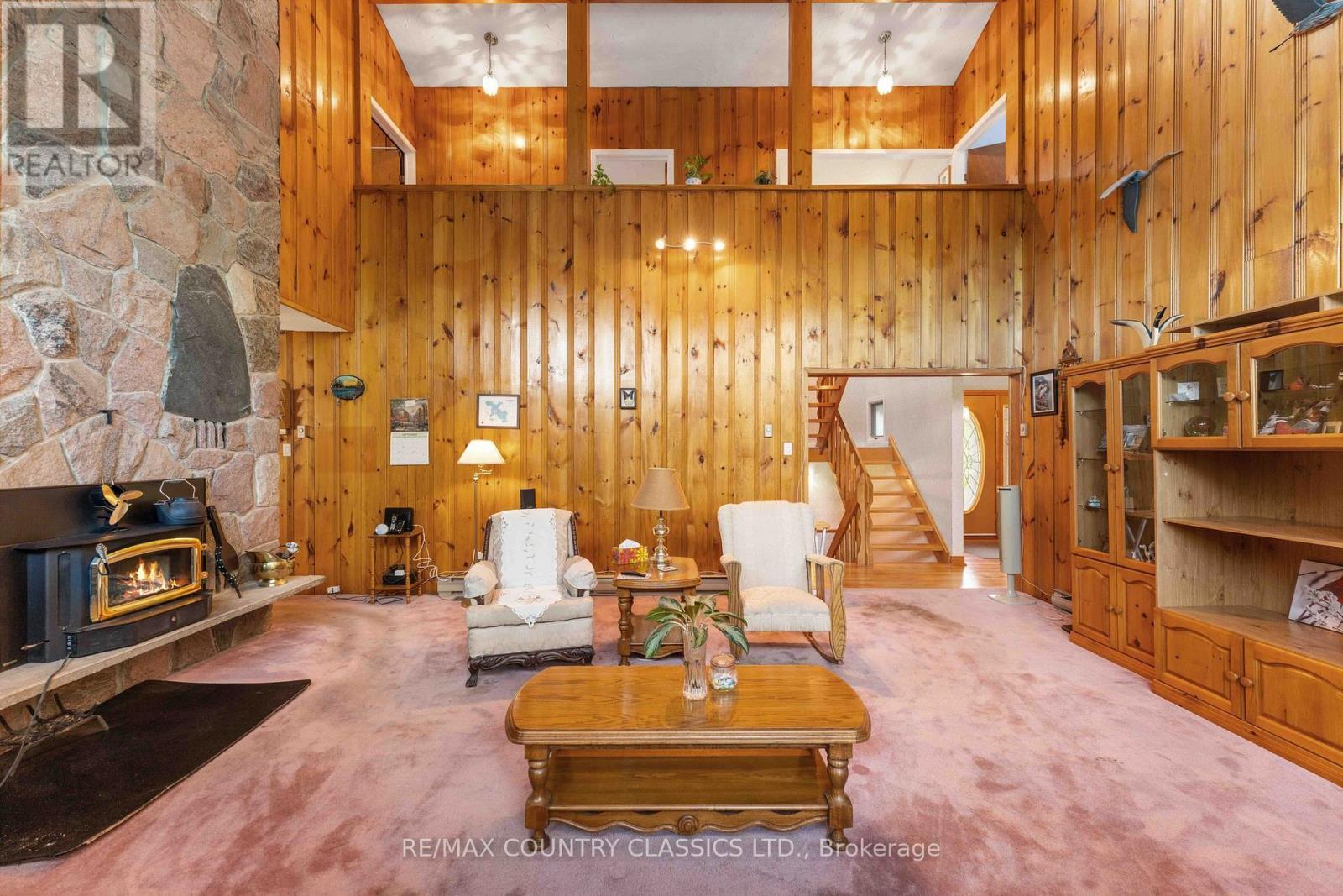 13 Lorbetskie Road, Madawaska Valley, ON - Indoor Photo Showing Living Room With Fireplace