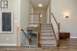 Stairs leading to 3 bedrooms -