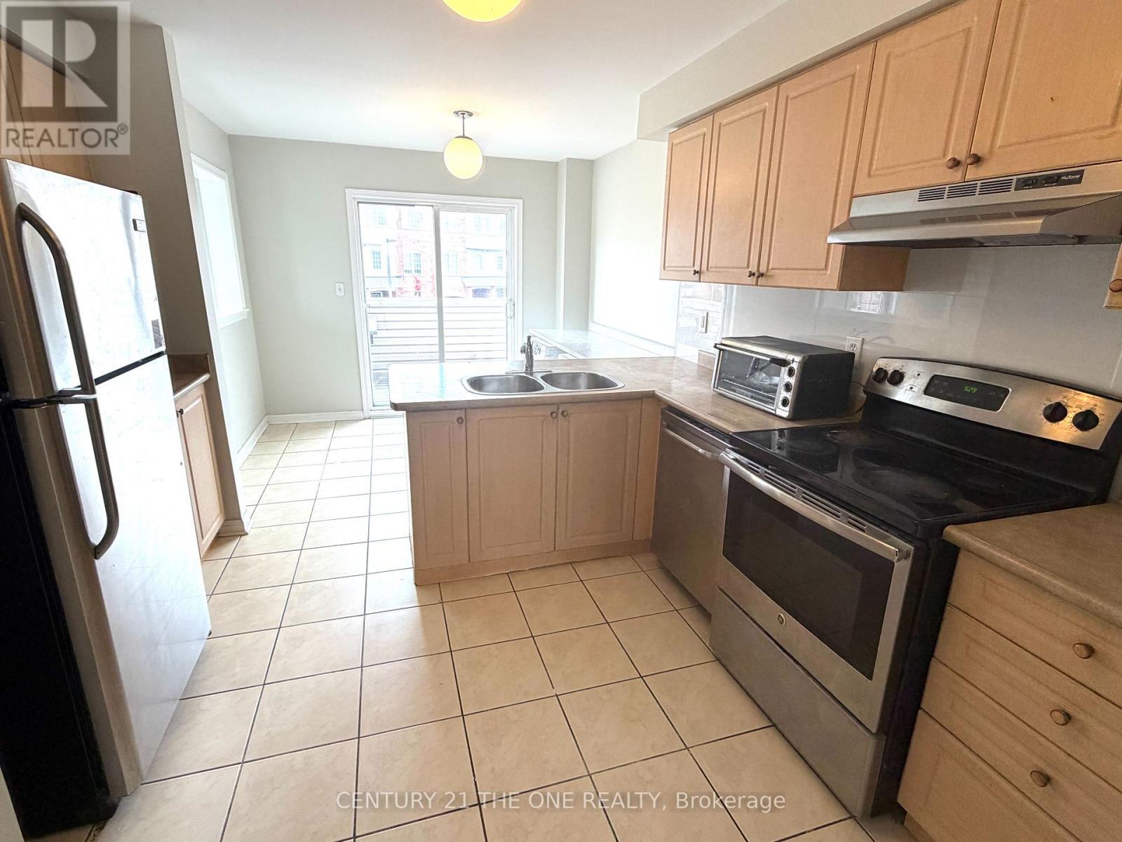56 - 3030 Breakwater Court, Mississauga, ON - Indoor Photo Showing Kitchen With Double Sink