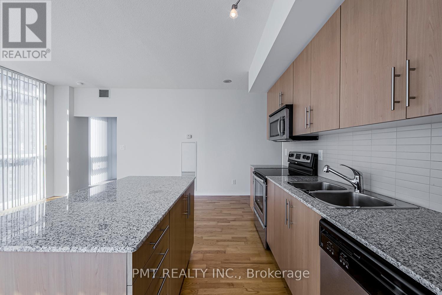 1707 - 55 Bremner Boulevard, Toronto, ON - Indoor Photo Showing Kitchen With Double Sink