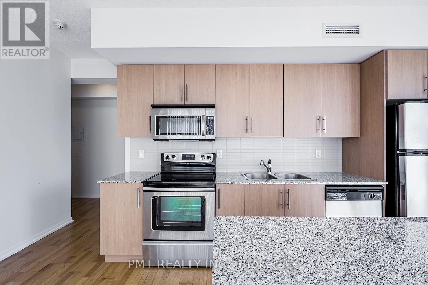 1707 - 55 Bremner Boulevard, Toronto, ON - Indoor Photo Showing Kitchen With Double Sink