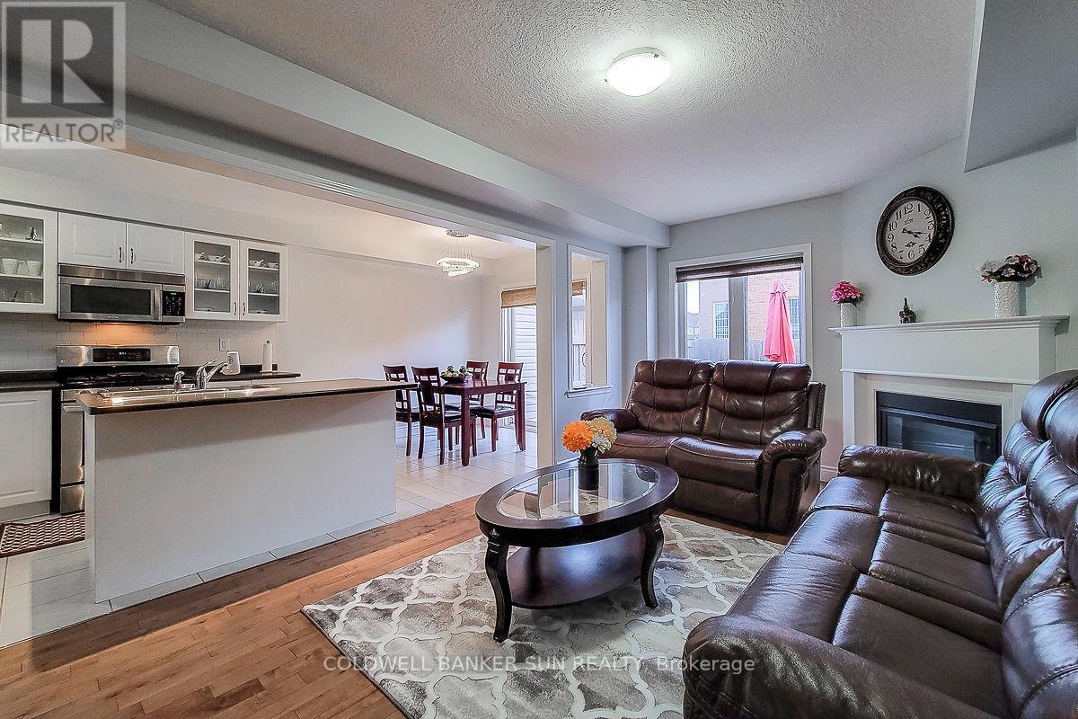 62 Lynch Crescent, Hamilton, ON - Indoor Photo Showing Living Room With Fireplace