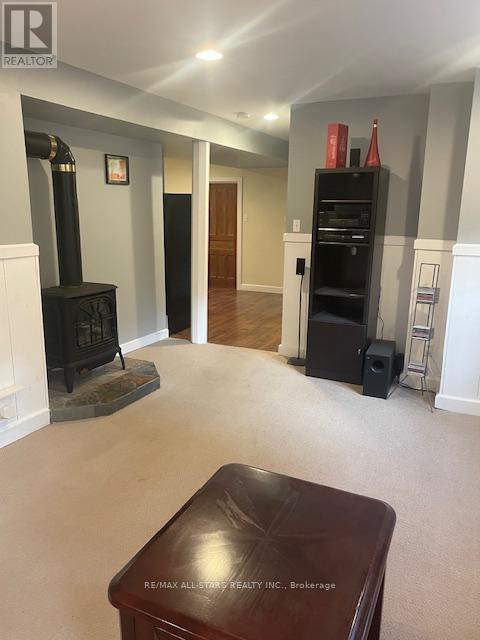 Basement - 2036 Lilac Drive, Innisfil, ON - Indoor With Fireplace