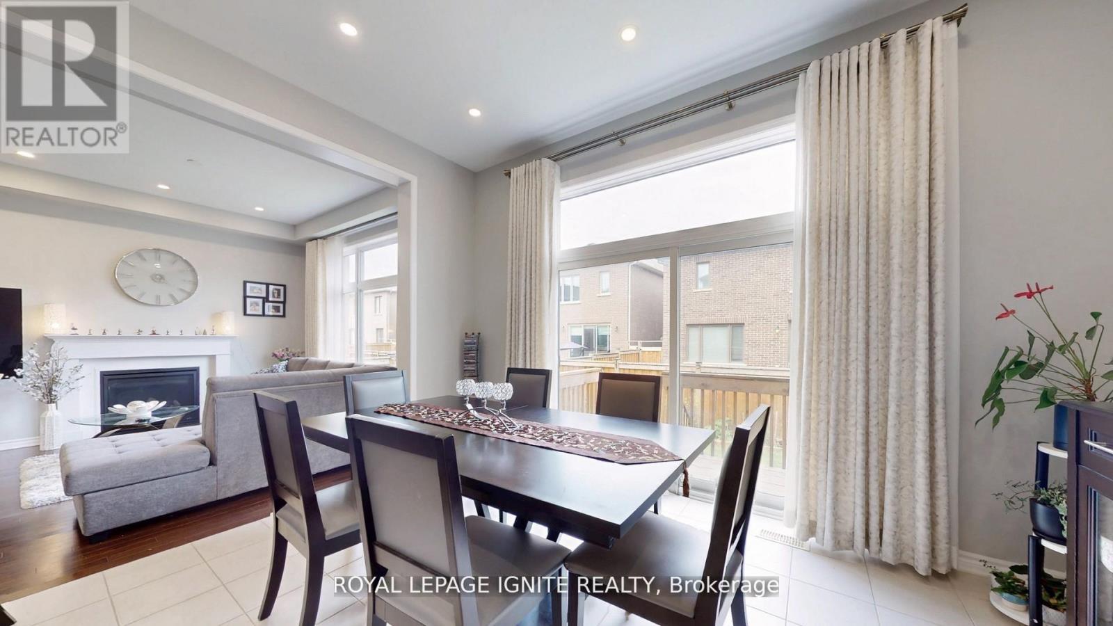 546 Kennedy Circle W, Milton, ON - Indoor Photo Showing Dining Room With Fireplace