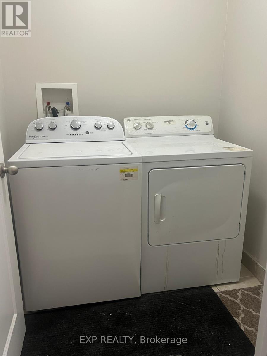 Upper - 10 Dufay Road, Brampton, ON - Indoor Photo Showing Laundry Room