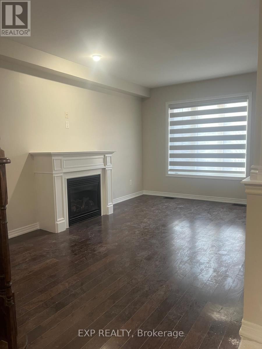 Upper - 10 Dufay Road, Brampton, ON - Indoor With Fireplace