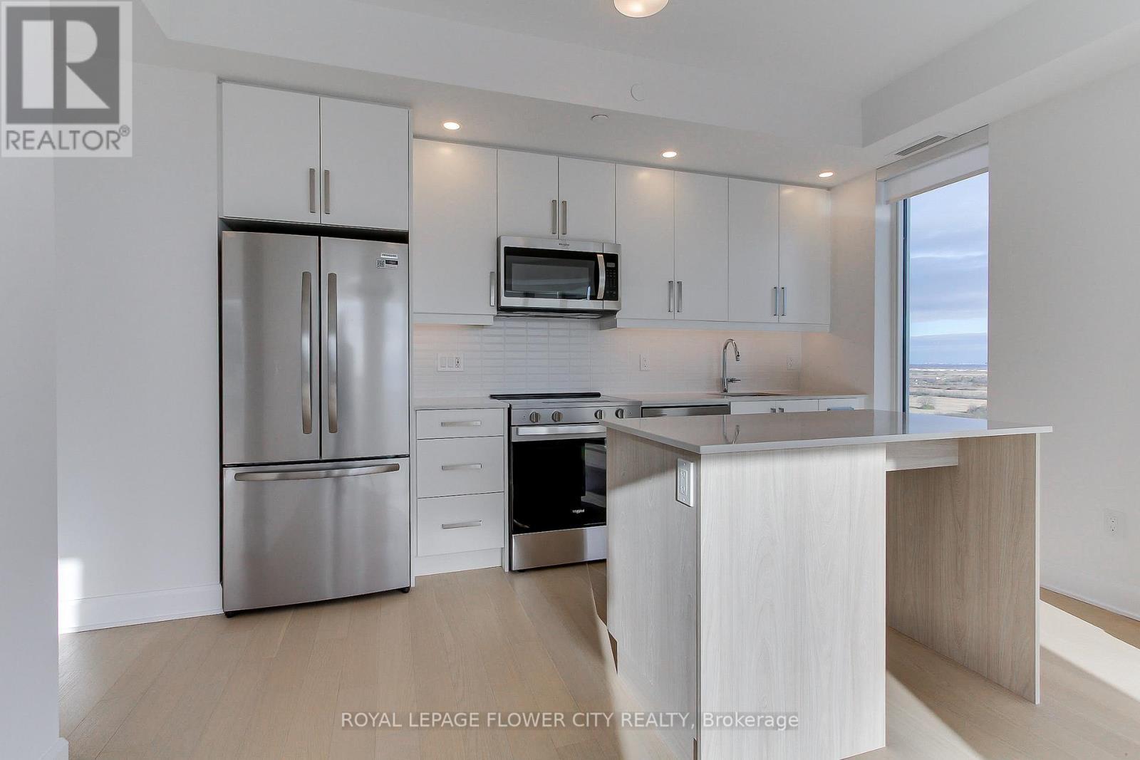 1808 - 3240 William Coltson Avenue E, Oakville, ON - Indoor Photo Showing Kitchen With Upgraded Kitchen