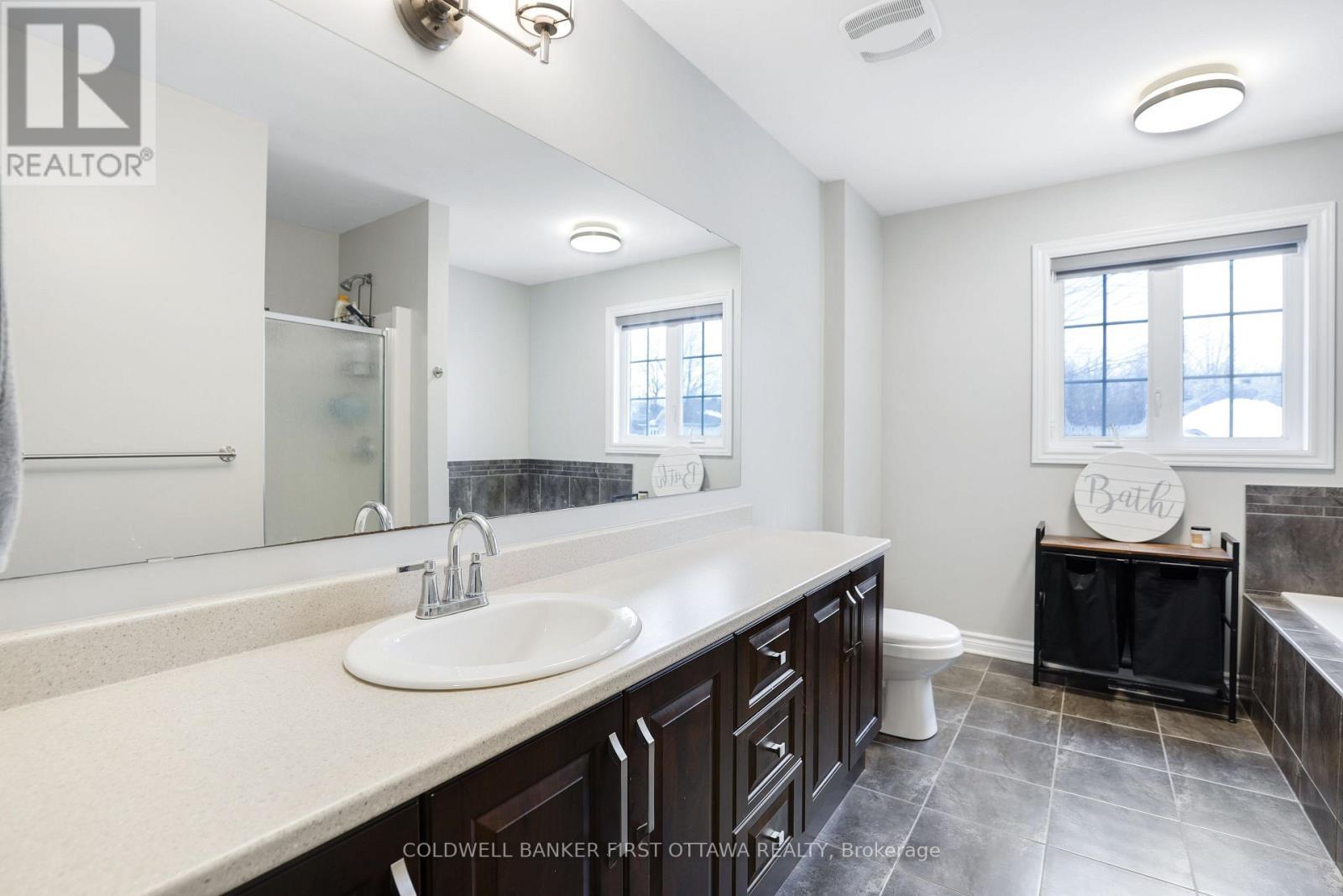 21 Constantineau Street, The Nation, ON - Indoor Photo Showing Bathroom