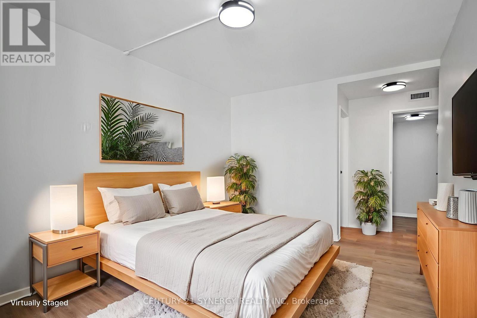 Virtually Staged Primary Bedroom - 505 - 330 Centrum Boulevard, Ottawa, ON - Indoor Photo Showing Bedroom