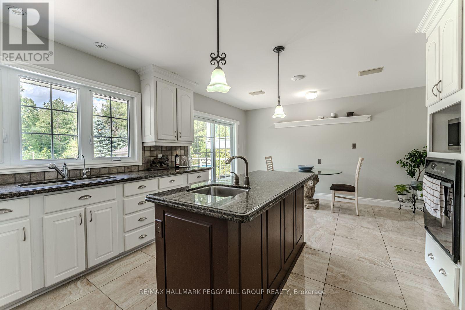 2 Mills Circle, Springwater, ON - Indoor Photo Showing Kitchen With Double Sink