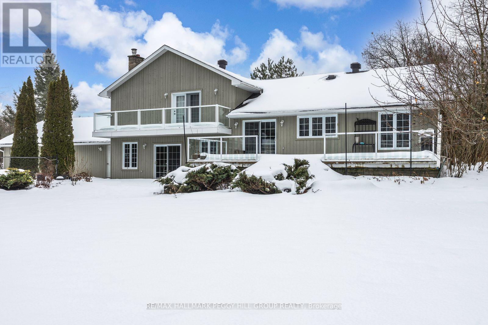 2 Mills Circle, Springwater, ON - Outdoor With Facade