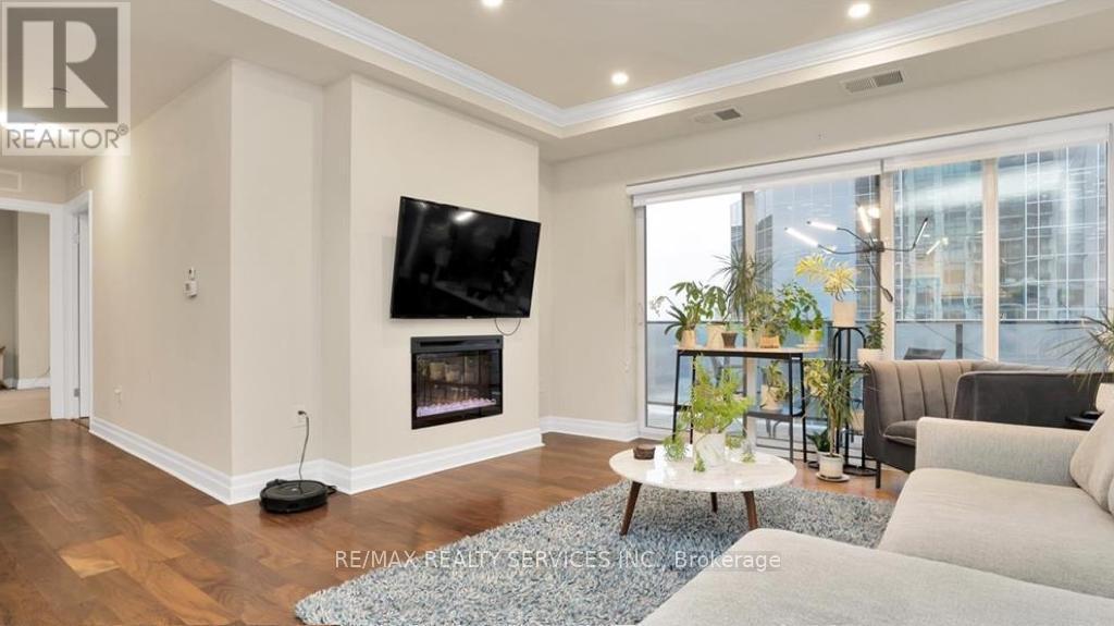 1205 - 505 Talbot Street, London East, ON - Indoor Photo Showing Living Room With Fireplace