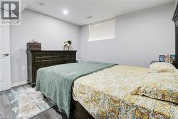 Bedroom featuring wood finished floors and recessed lighting -