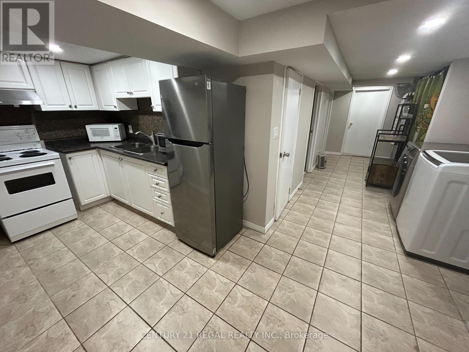 45 Fifteenth Street, Toronto, ON - Indoor Photo Showing Kitchen With Double Sink