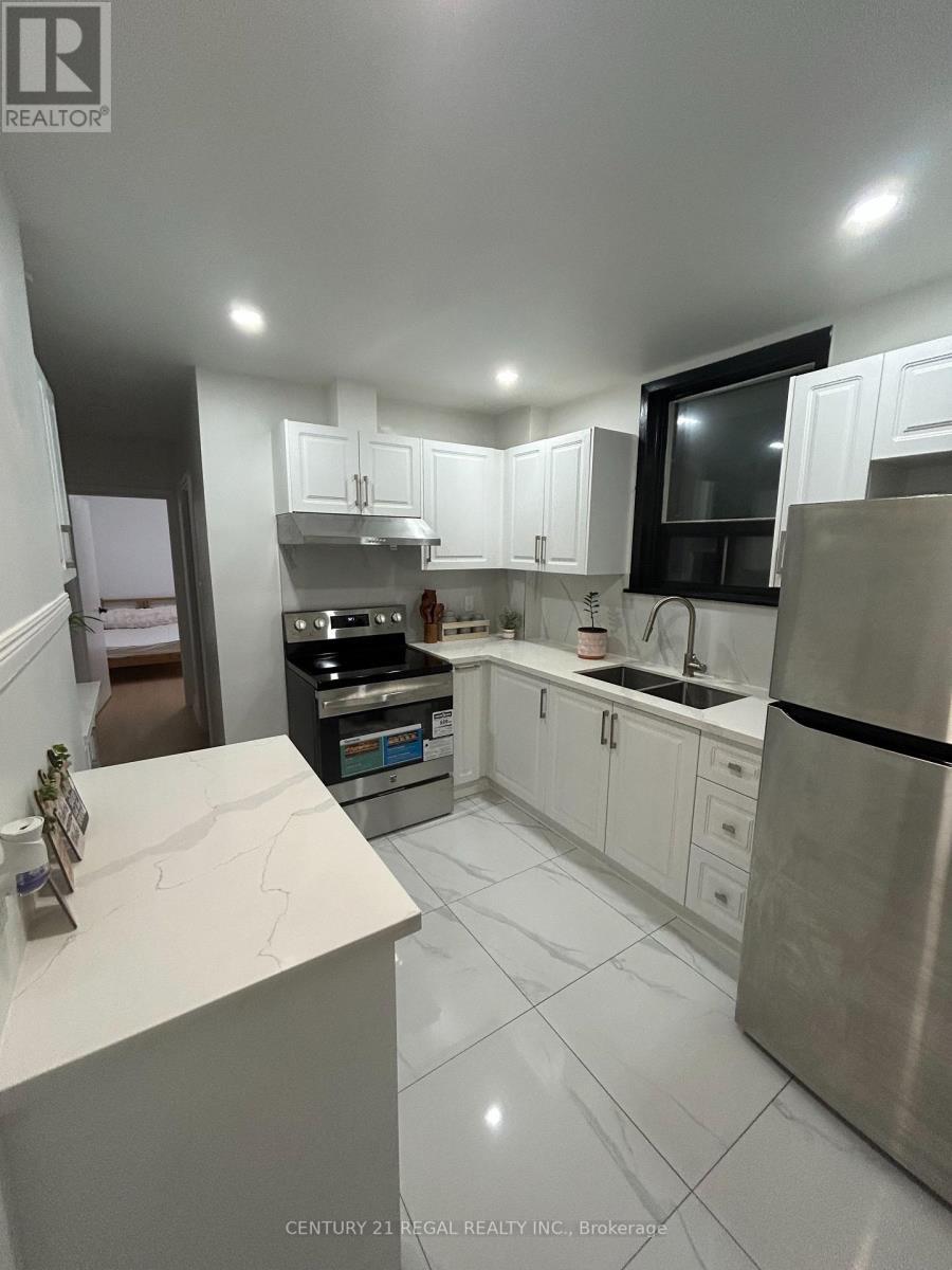 45 Fifteenth Street, Toronto, ON - Indoor Photo Showing Kitchen With Double Sink