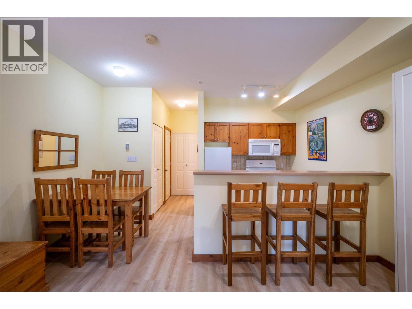 Kitchen and dining area - 9812 Silver Star Road Unit# 103, Vernon, BC - Indoor