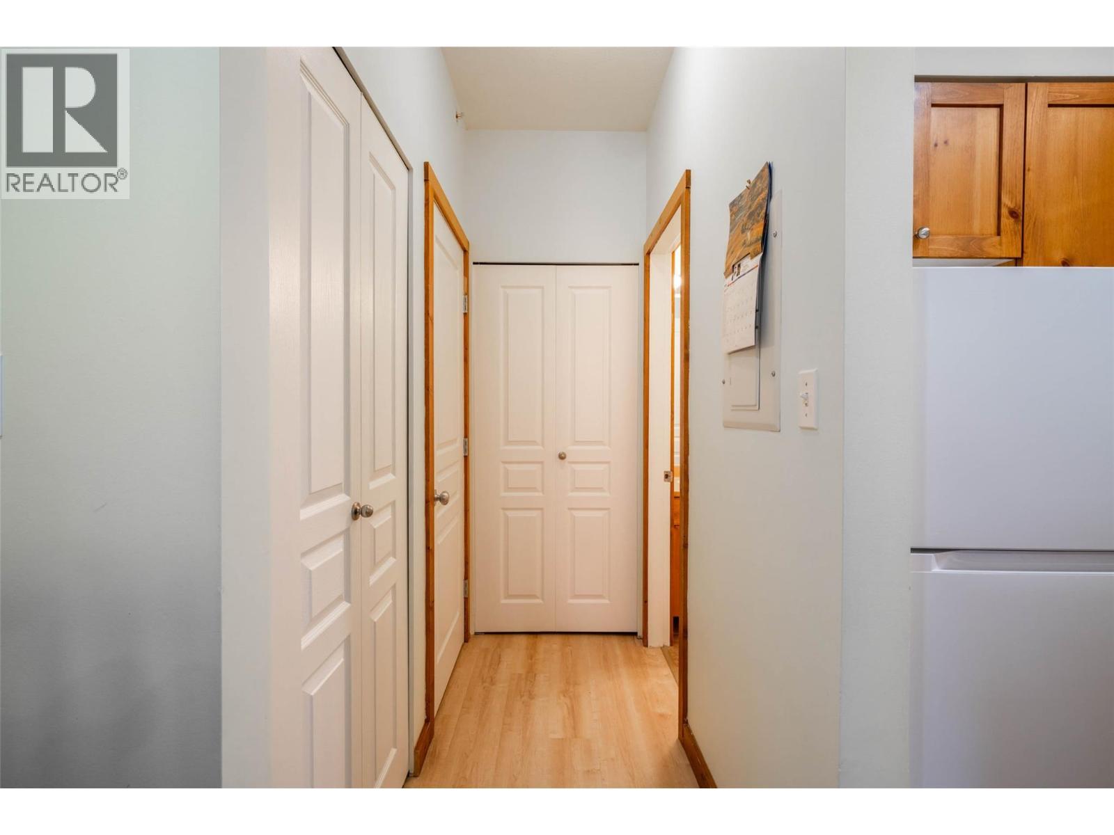 Hallway with a pantry and two closets - 9812 Silver Star Road Unit# 103, Vernon, BC - Indoor Photo Showing Other Room