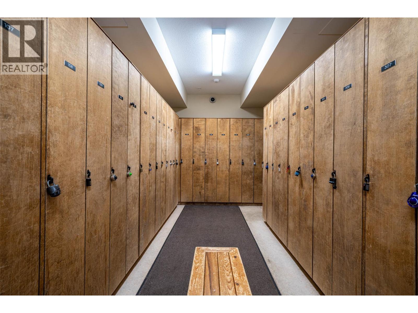Storage lockers in the common area of the Wildwood Building (Locker #103) - 9812 Silver Star Road Unit# 103, Vernon, BC - Indoor Photo Showing Other Room