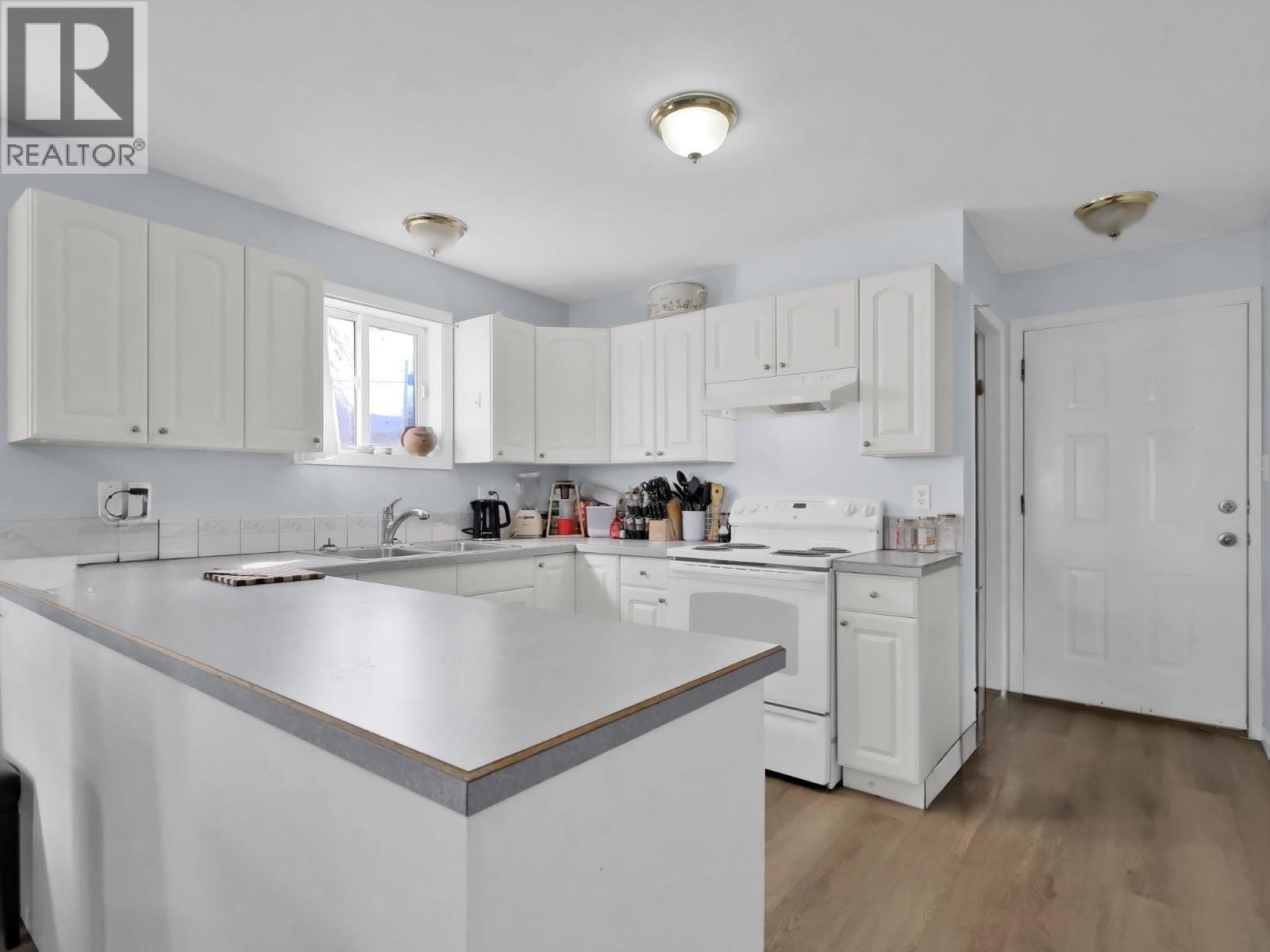 654 Wade Avenue W Unit# 101 & 201, Penticton, BC - Indoor Photo Showing Kitchen With Double Sink
