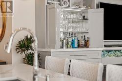 Wall unit with fireplace, bar & wine hutch -