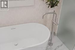 Floor Mounted Tub Filler -