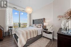 Second Bedroom with floor to ceiling windows -