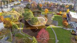 Beautifully kept grounds with pond & walking paths -