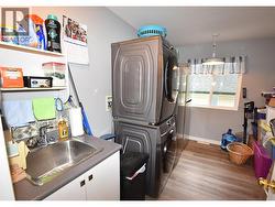 main floor laundry with utility sink -