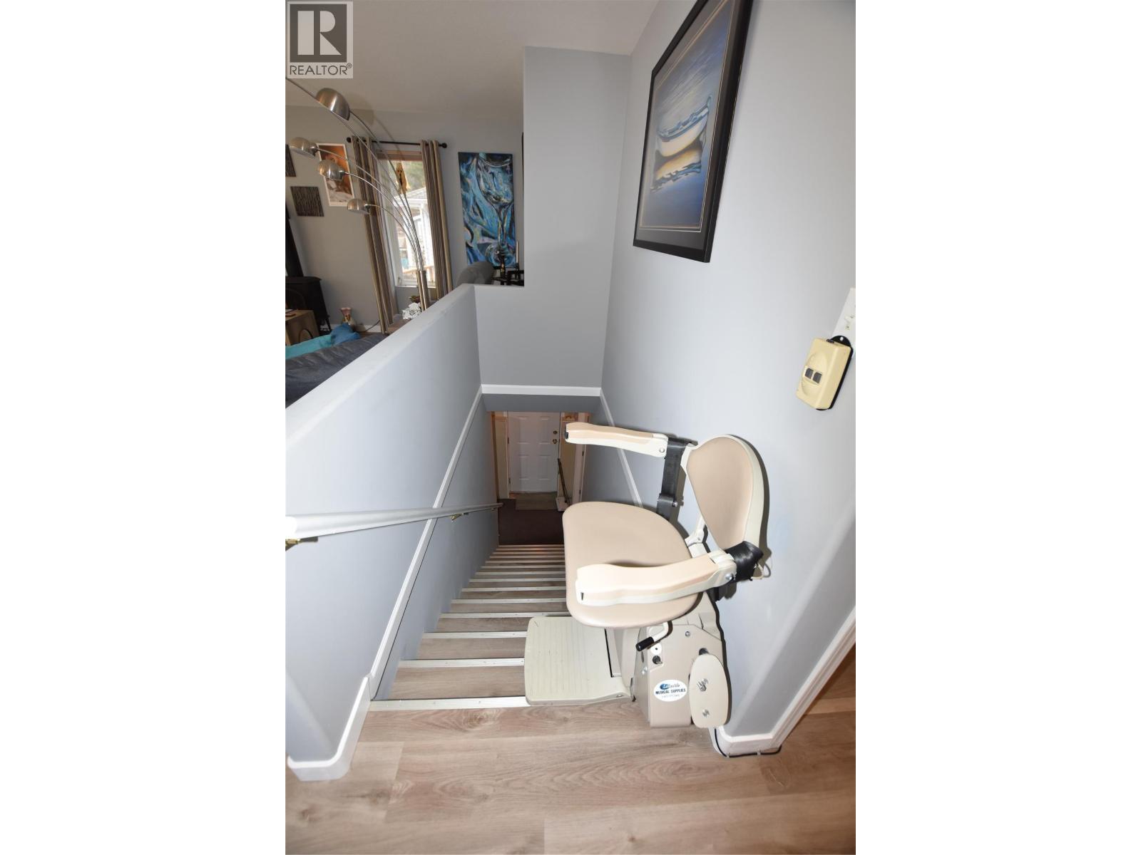 Chair lift to the basement - 145 Falcon Avenue, Vernon, BC - Indoor Photo Showing Other Room