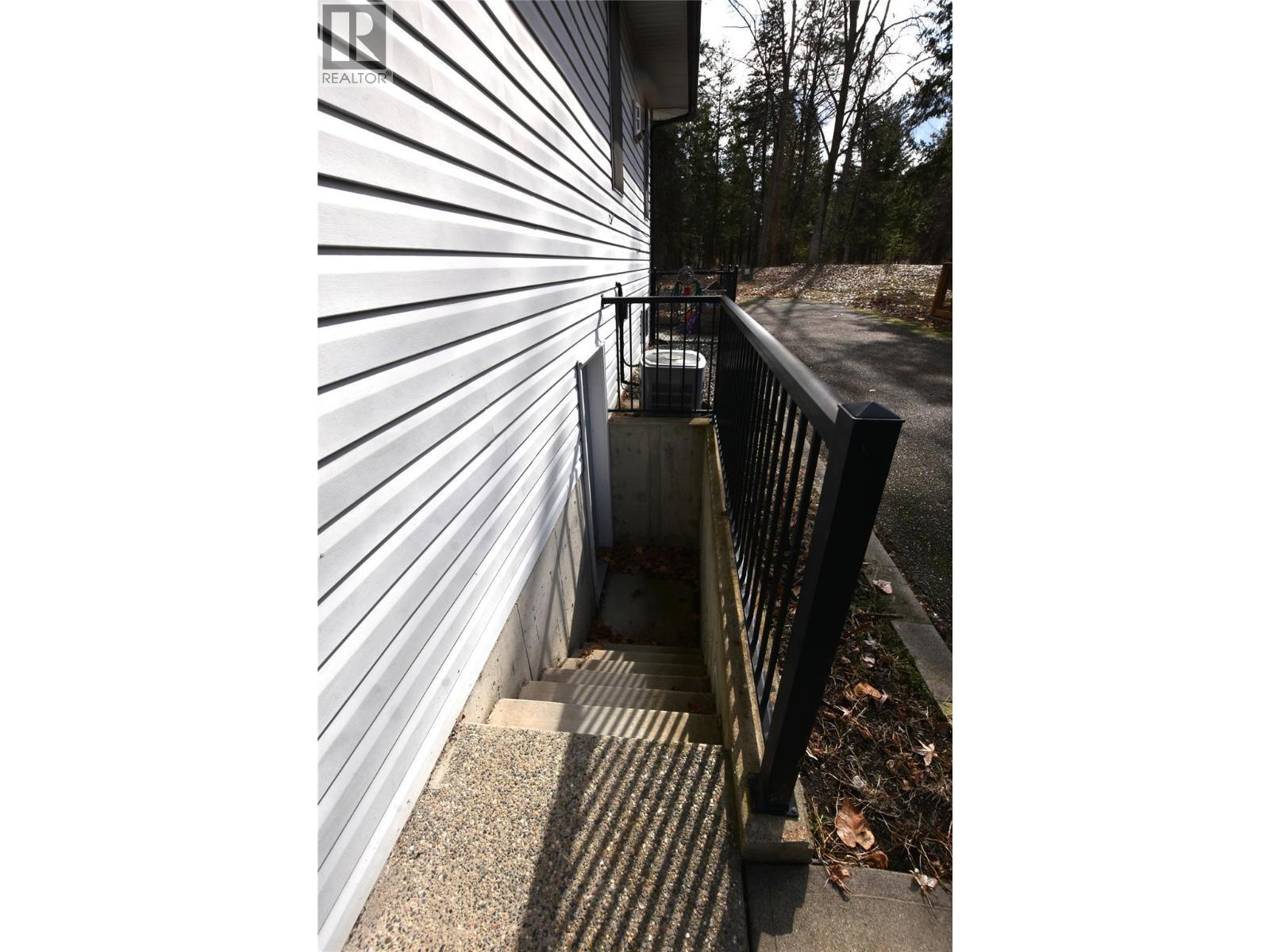 stairs to basement door - 145 Falcon Avenue, Vernon, BC - Outdoor