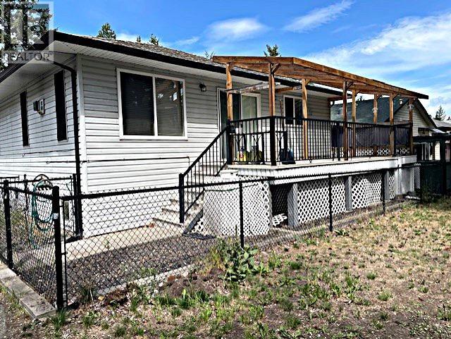 Fenced yard - 145 Falcon Avenue, Vernon, BC - Outdoor With Deck Patio Veranda