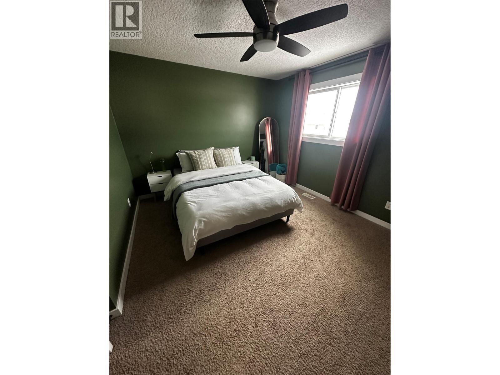 5213 40 St Ne Street, Chetwynd, BC - Indoor Photo Showing Bedroom
