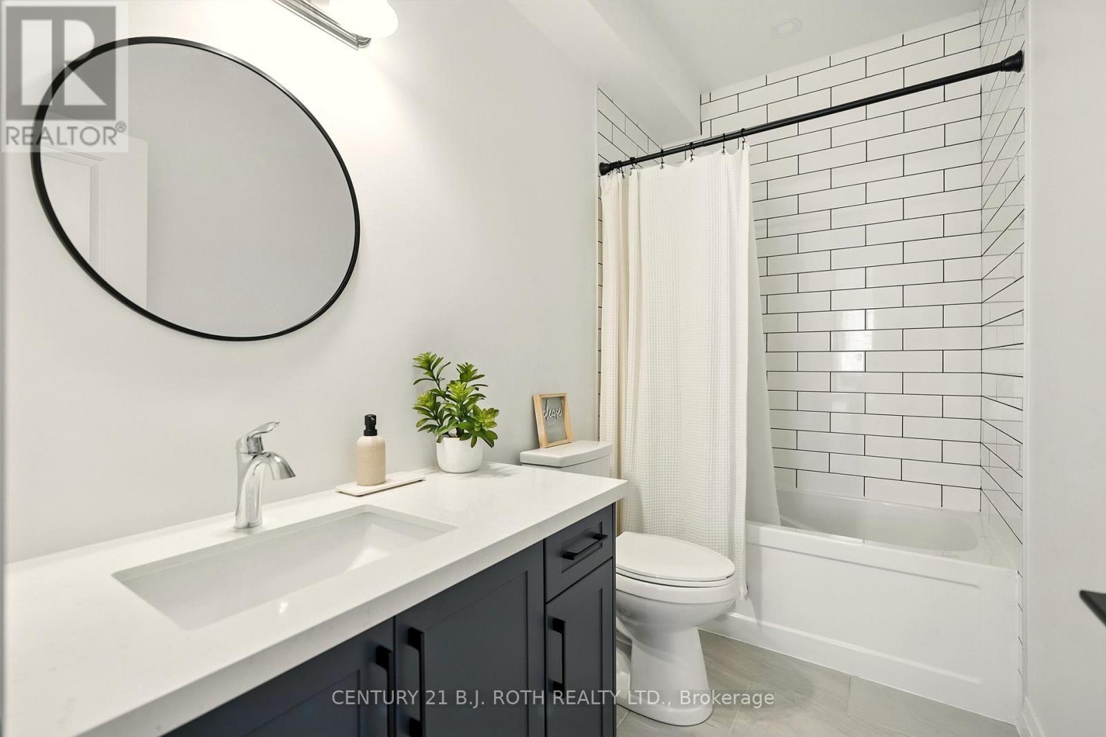 124 Ritchie Crescent, Springwater, ON - Indoor Photo Showing Bathroom