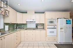 Kitchen view 3 plenty of cabinet space -