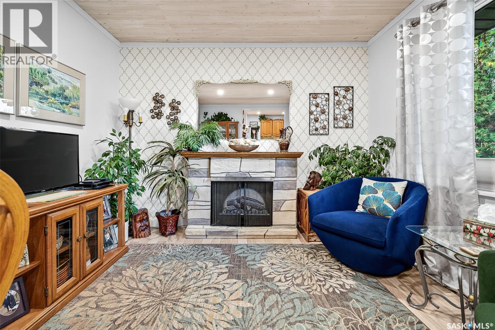 1005 Vaughan Street, Moose Jaw, SK - Indoor Photo Showing Other Room With Fireplace