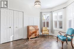 Bedroom to the right with California shutters -